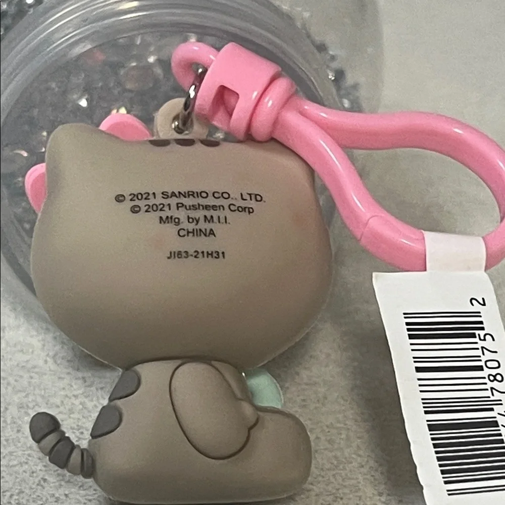 Sanrio Brown Cat Keychain with Pink Bow